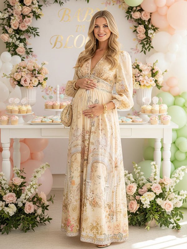 Beige floral boho maternity maxi dress with shaped waistband and flowy silhouette.