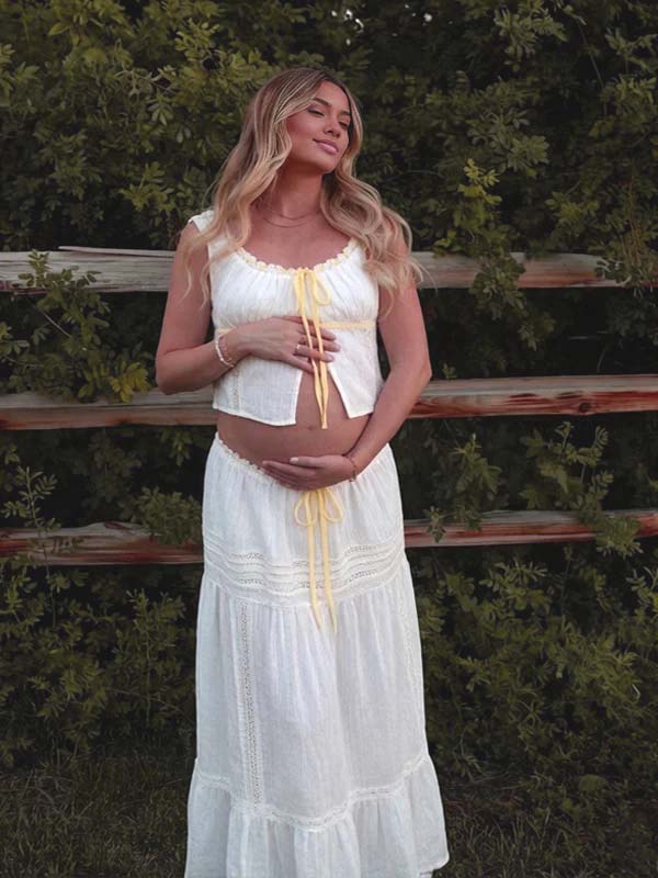 White Boho lace maternity maxi dress with ribbon high-waisted two-piece design and elegant silhouette, designed for photoshoot.